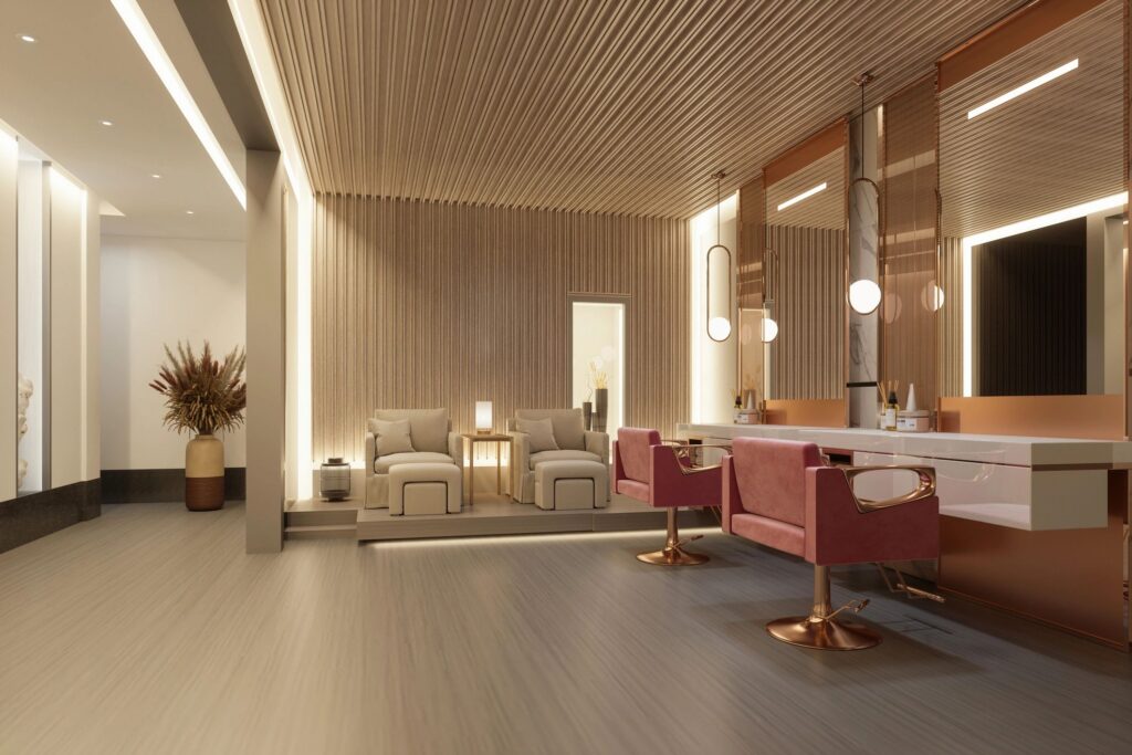 Modern Hairdressing And Beauty Salon Interior With Lighting Equipments, Pink Chairs And Mirrors