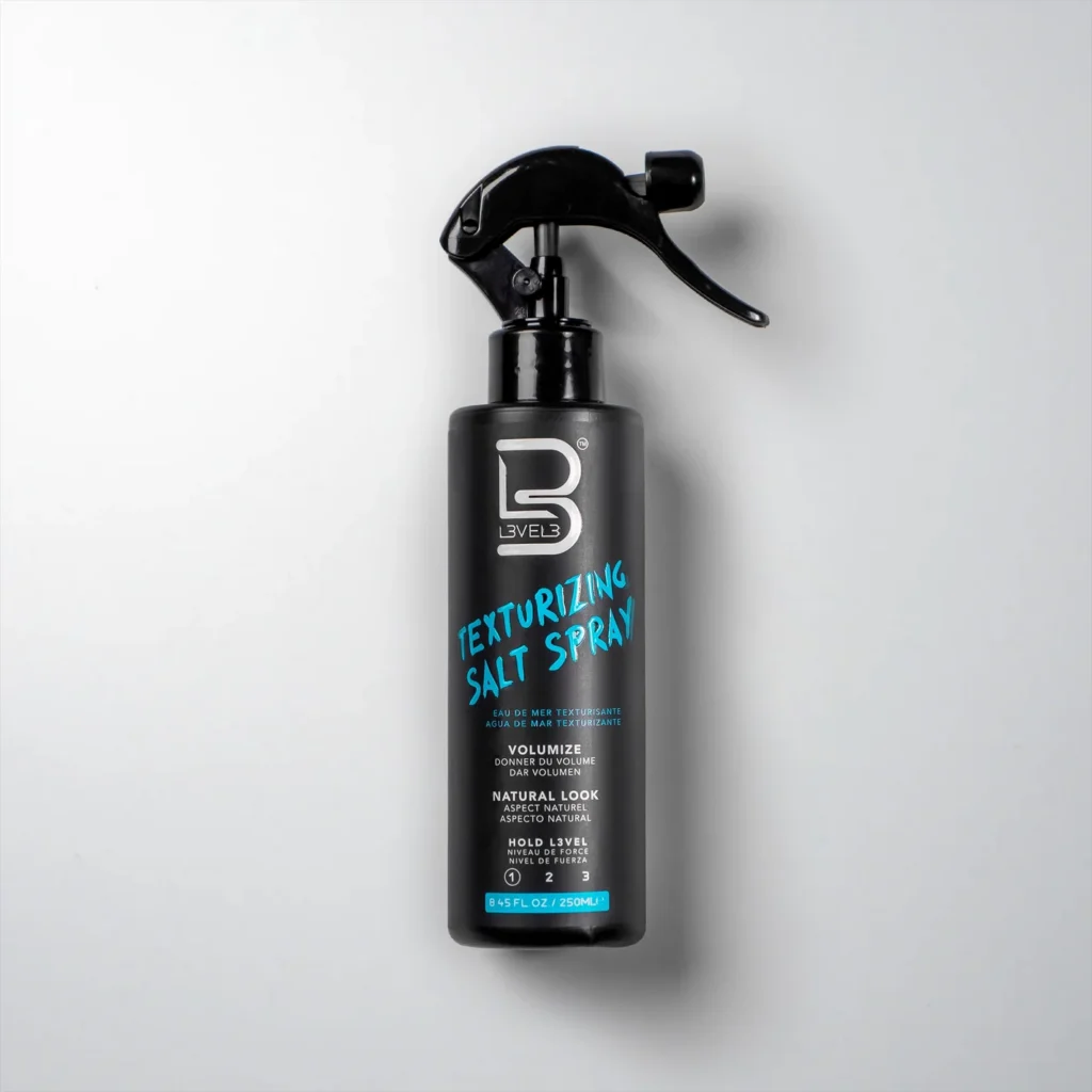 Black texturizing salt spray bottle on white