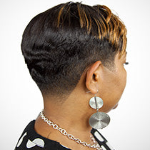 Side view woman with short haircut and earrings